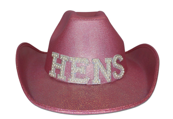 Pink cowboy hat w/ the letters 'HENS'